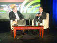 U.S. Rep. Luis Gutierrez (right) talks with moderator Willie Lora. Photo by Carrie Maxwell