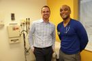 Dr. Rob Garofalo (left) and Dr. Travis Gayles in clinic. Photo credit Terry Janice. 