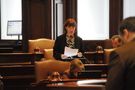 Heather Steans reads the proposed bill. Photo by Hal Baim