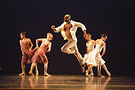 River North Dance Chicago's Levizadik Buckins and ensemble in Eva by Frank Chaves. Photo by Cheryl Mann
