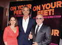 Gloria and Emilio Estefan with director Jerry Mitchell (center). Photo by Bruce Glikas