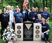 The first federally approved LGBT Veterans Monument on federal land was dedicated Memorial Day 2015 at Abraham Lincoln National Cemetery in Elwood, Illinois. Pictured are members of the American Veterans for Equal Rights-Chicago chapter, and allies. AVER member Stanley Jenczyk spearheaded the project. Photo by Hal Baim 