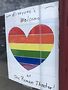 Day seven: LGBTQ-inclusive sign in the window of The Roman Theater in Red Lodge, Montana. Photo by Kirk Williamson