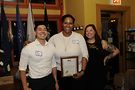 The Happy Warrior Award is presented to speaker Tatyana Moaton, center, by treasurer VP Ben Sauceda and chapter president Heather Yang. Photo by Hal Baim