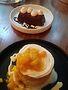 Mesa Urbana's rumchata mousse cake (top) and cinco leches cake. Photo by Andrew Davis