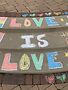 Love Is Love chalk art from the June 30 protest in Elk Grove Village. Image courtesy of Lynn (Kaylyn) Ahn