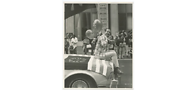 Leonard Matlovich was seated on a Lambda American flag in the June 1979 San Francisco Pride parade. Photo from Joe Altman collection; California Historical Society