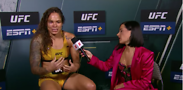 Amanda Nunes (left) in post-fight interview. Screenshot courtesy of YouTube/ESPN MMA 