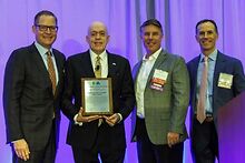 Harris receives Outstanding Leadership Award from IHA 