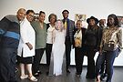 Family members pose with cutout of Gloria Allen (center). Photo by Vern Hester
