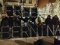 Protestors hold Free Bernina sign. Photo by Carrie Maxwell