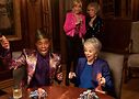 Billy Porter (left) plays poker with Rita Moreno (right), as Jane Fonda and Lily Tomlin look on, in Eighty for Brady. Photo from Paramount Pictures 