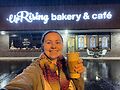 UpRising Bakery and Cafe exterior with owner Corinna Sac. Photo courtesy of Sac