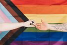 Progress Pride flag. Photo by Lisett Kruusimae for Pexels