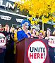 Irregular Girl speaks at Oct. 25 rally. Photo By Unite Here Local 1